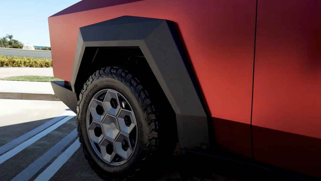  Metallic Red Cybertruck in parking area