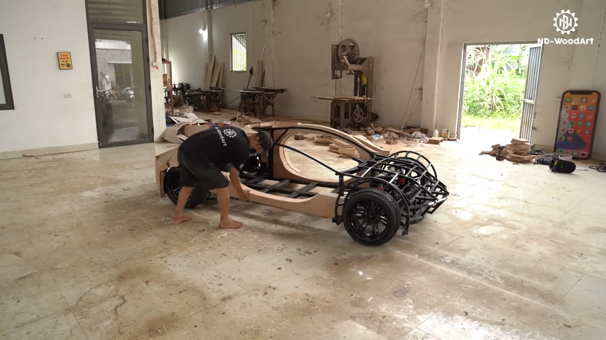 Father Crafts Wooden Apple Car for Son After Tech Giant Scraps Project